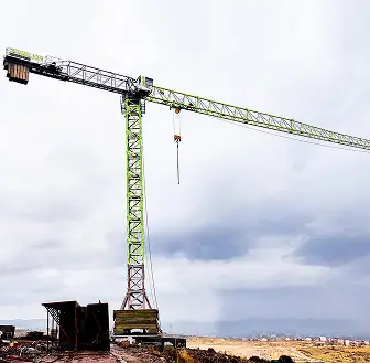 Zoomlion W7020-12E tower crane at commercial construction site