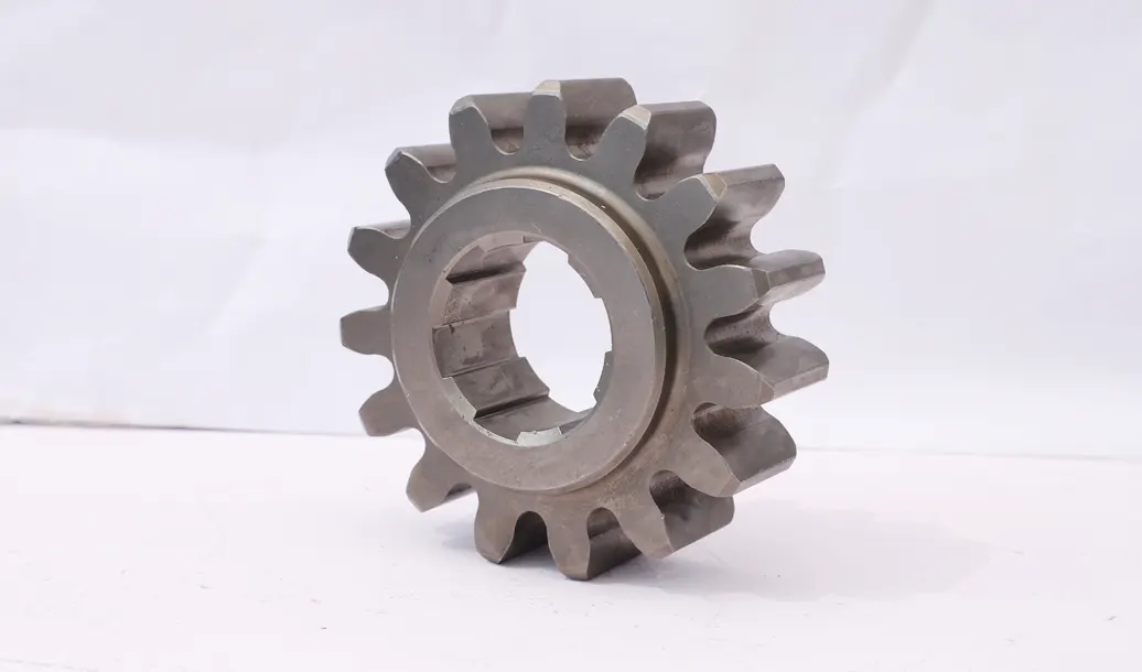 Gear pulley and pinion drive assembly for tower cranes